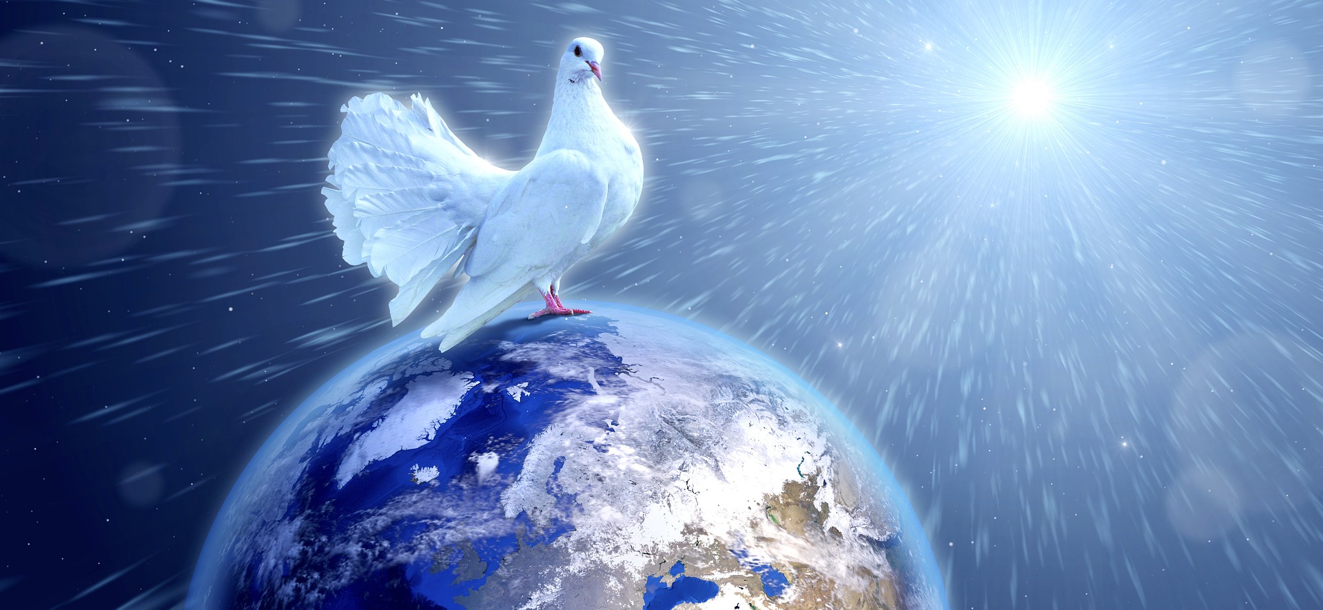 The Sun shines on the Earth. A giant Dove of Peace is perched atop the Earth. There is a beautiful brilliance.