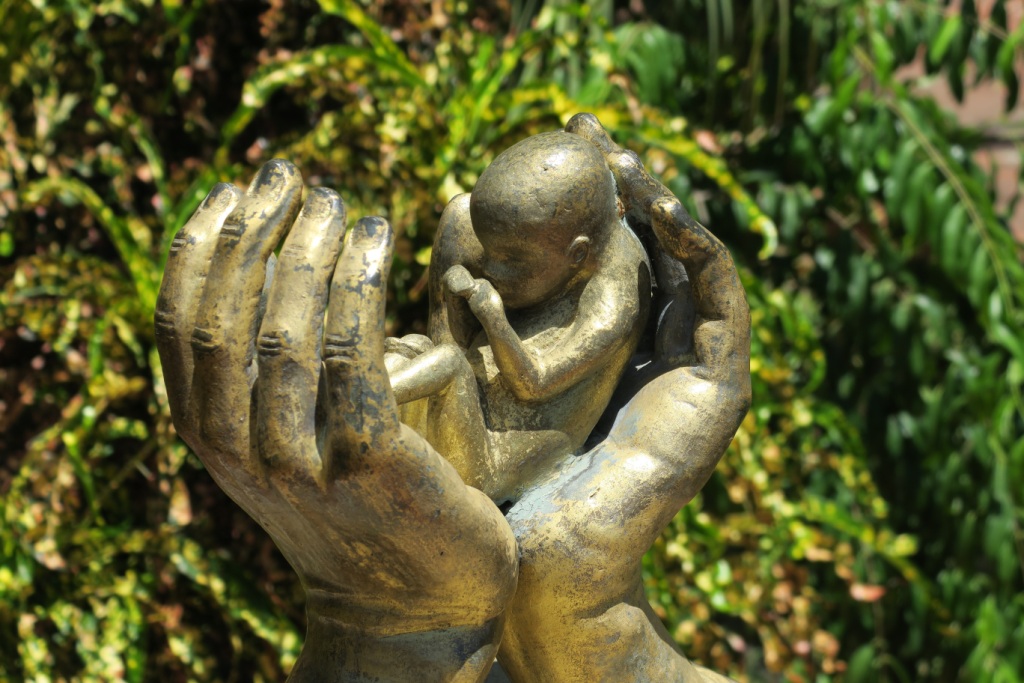 Protective Hands sculpture