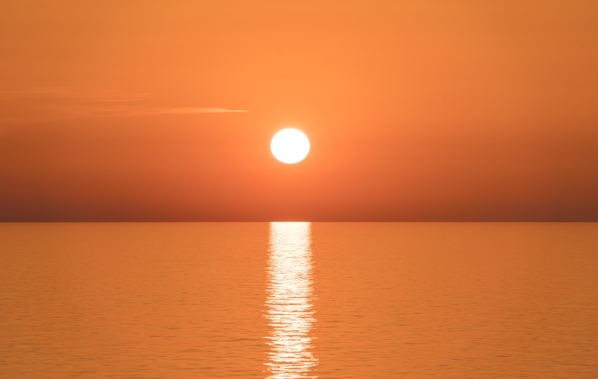 A sunrise over calm waters in Venice, Italy