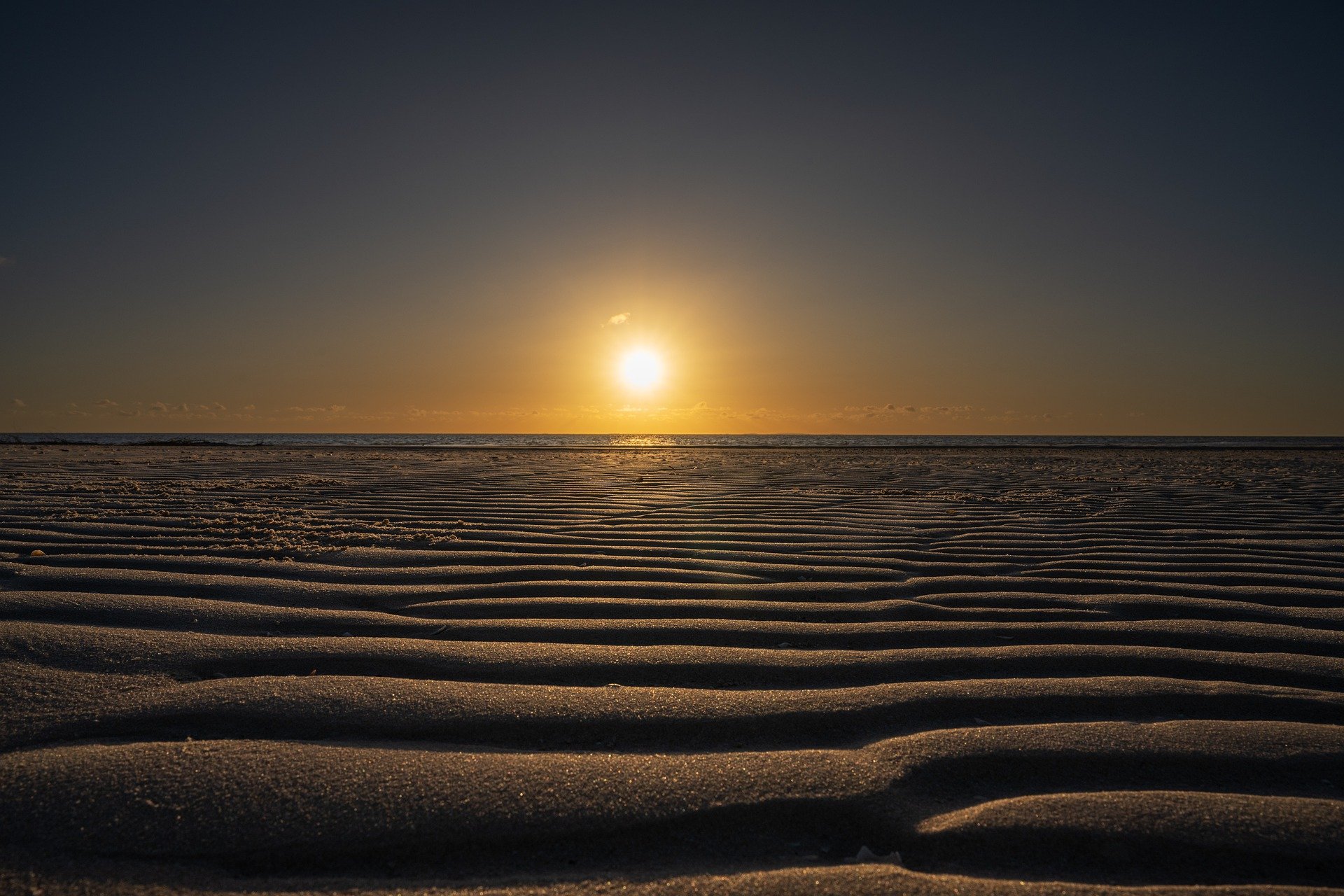 A sunrise in West Australia over a beach